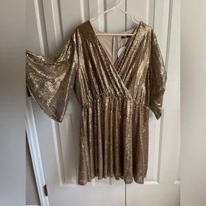 Gold sequence plus party dress